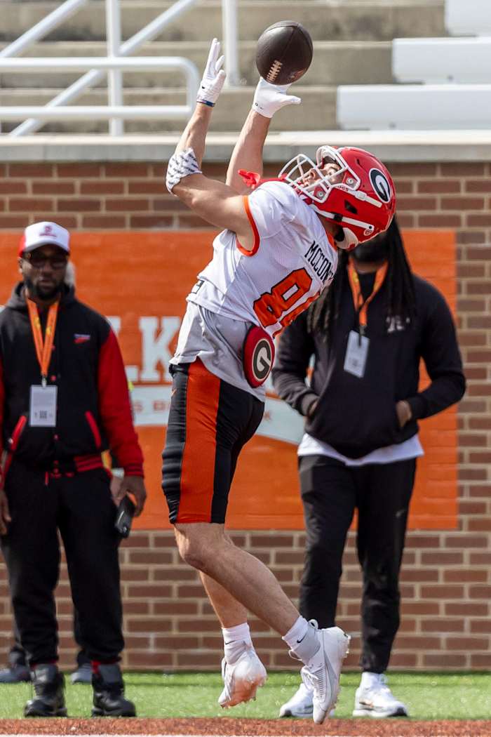Feb 1, 2024; Mobile, AL, USA; American wide receiver Ladd McConkey of Georgia makes an over the shoulder catch during practice for the American team at Hancock Whitney Stadium. © Vasha Hunt-USA TODAY Sports